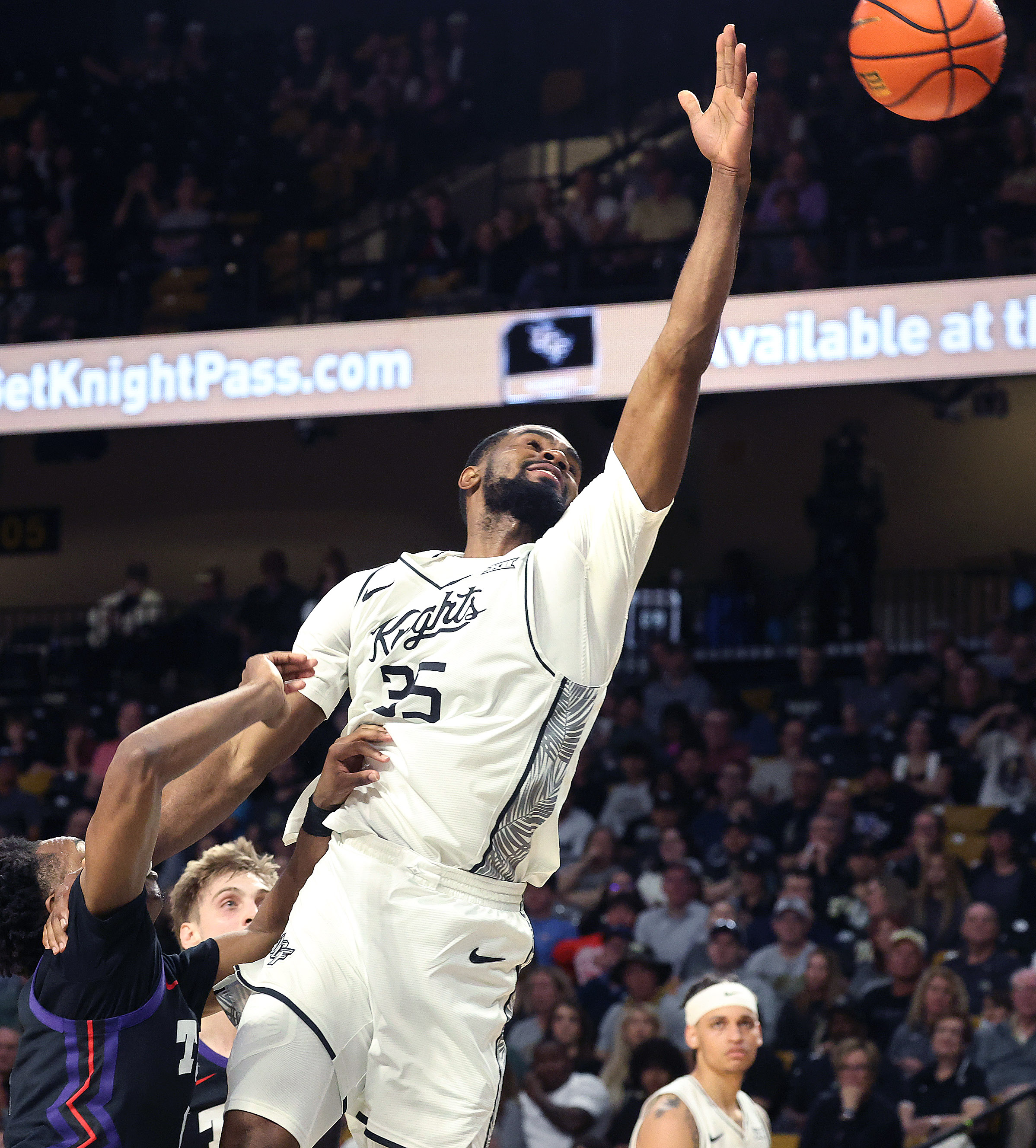 UCF forward Devan Cambridge (35) reaches for a rebound during...