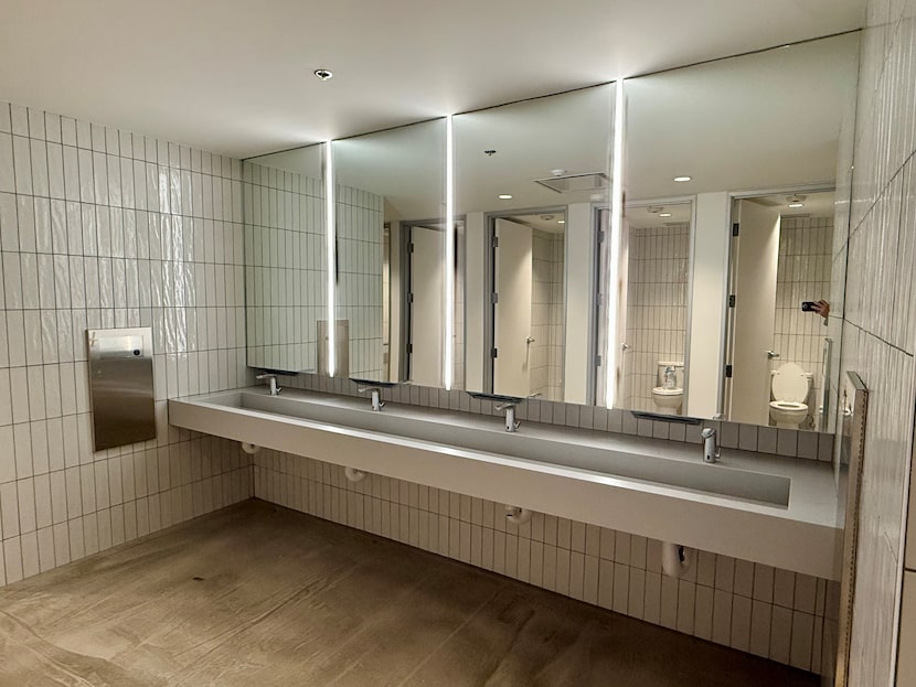 You could purchase the naming rights to one of Kitchen Dog Theater's new unisex bathroom...