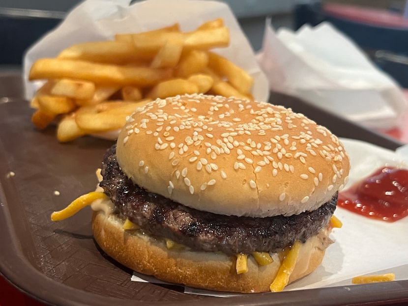 Goff's places shredded cheese at the base of its burgers.