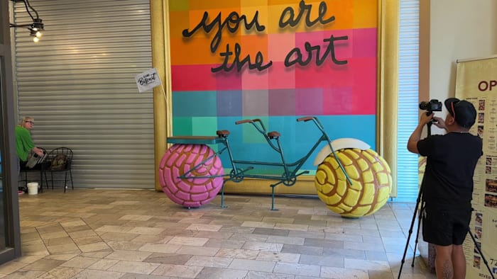 Concha-themed bike installation opens outside River Walk’s Alamo Biscuit restaurant