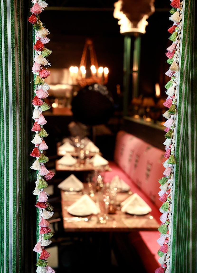 A new curtained entrance to The Charles makes your arrival feel less abrupt.