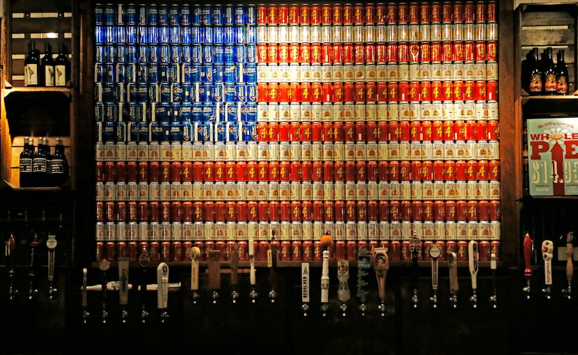 At the Dallas original, The Rustic has an American flag over the bar made of beer cans.