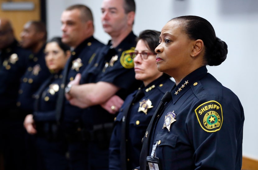 Dallas County Sheriff Marian Brown listens during a press conference at the Frank Crowley...
