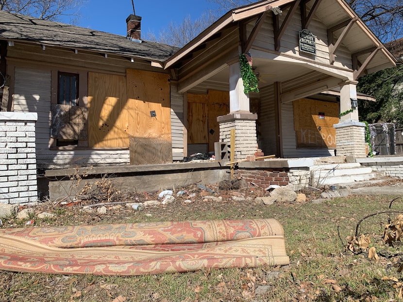 Neighbors say squatters have been living inside 4619 Gaston Avenue for years, and that their...