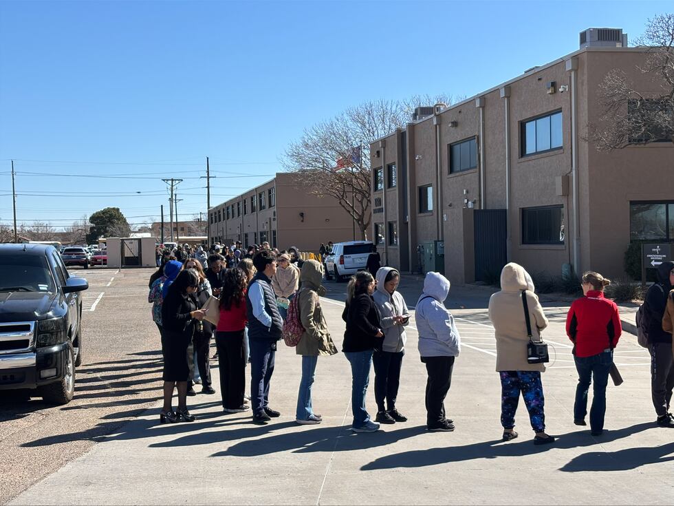 Families gathered outside Lubbock ISD headquarters mid-day Friday, Feb. 20, awaiting...