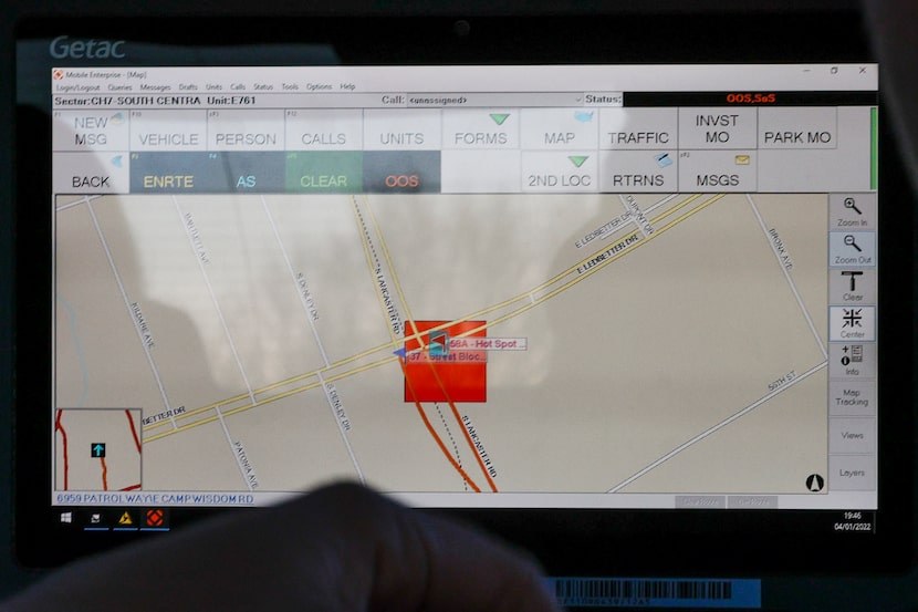 A red box pictured on the computer of a Dallas police patrol car shows a crime hot spot in...