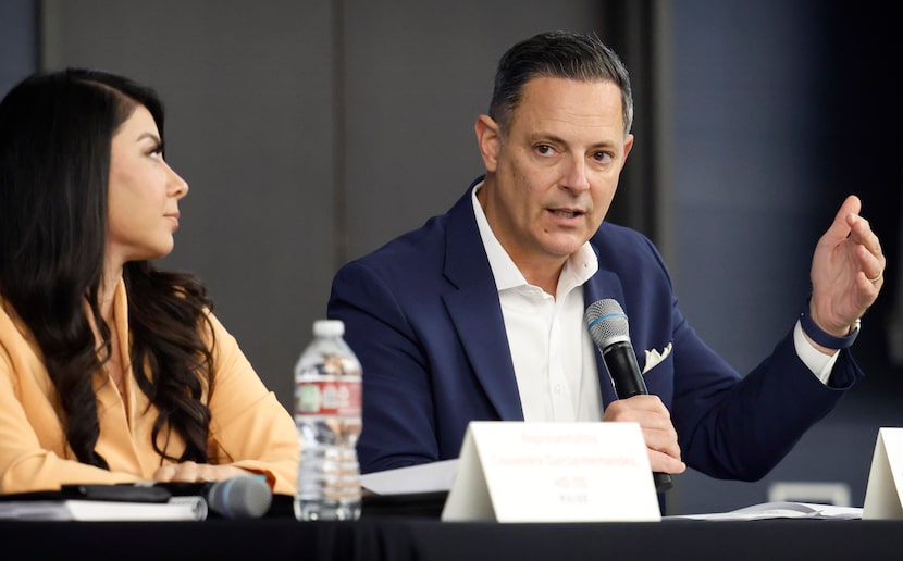  State Representative Rafael Anchia of District 103 (right) responds to a question as...