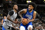 Dallas Mavericks forward Marvin Bagley III (35) drives against San Antonio Spurs guard...
