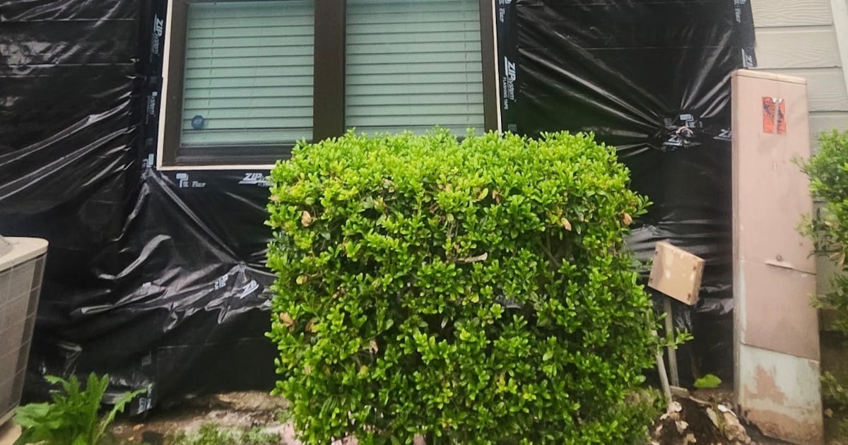 Dallas condo owners live for a year with no walls — just a tarp