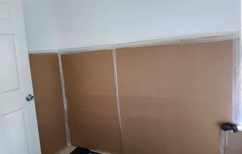 Without walls, condo owners use cardboard to provide safety from the elements.