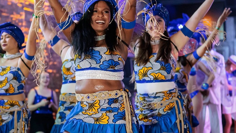 {p}Anne-Charlotte Patterson said, “Austin Samba is one of the largest samba schools outside of Brazil. It's set up in a very authentic style. We have numerous drummers, different dance clubs that perform the traditional Rio style with the big feathers, and really powerful Afro dancers. We also have a very international group, including a number of Brazilians who are part of Austin Samba, and many of us have trained in Brazil. We also bring Brazilian instructors to Austin so that we are truly authentic in our dance styles and rhythms. It is a very high-energy style of music and dance.”{/p}