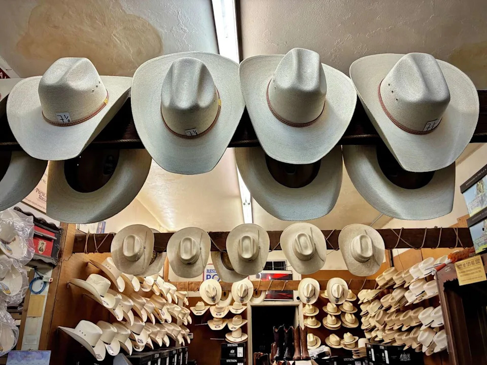 The walls of the shop are lined floor to ceiling with headgear of all kinds, not just cowboy hats. You can find fedoras, ball caps, bowlers and more here. (Emma Weidmann/MySA)