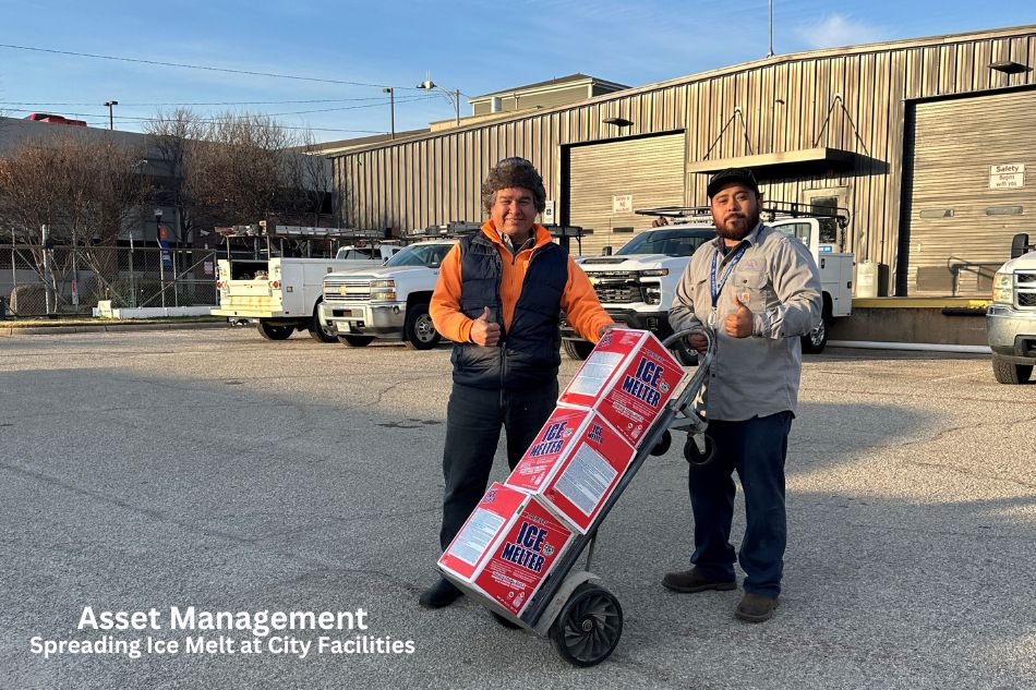 Asset Management employees prepare to spread ice melt on the sidewalks at City facilities in January 2026.