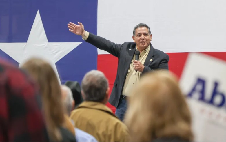 State Rep. John Lujan (HD 118) introduces Gov. Greg Abbott during a rally in February.