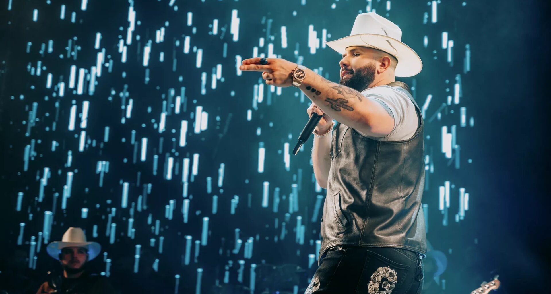 Carin León in concert in Dallas, solo onstage.