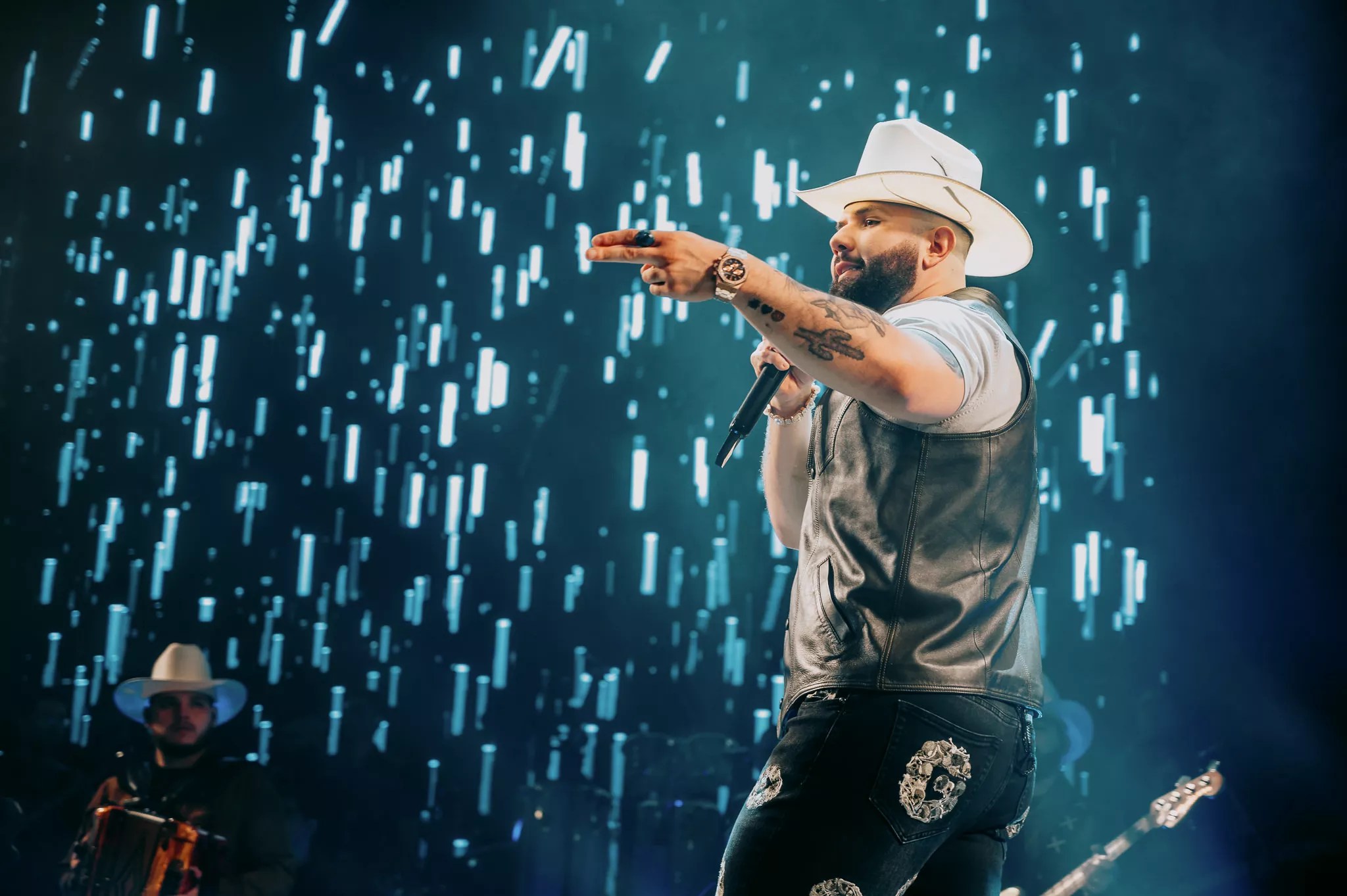 Carin León in concert in Dallas, solo onstage.