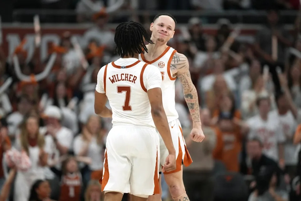 AUSTIN, TEXAS – FEBRUARY 7: Chendall Weaver #2 and Simeon Wilcher #7 celebrate after Wilcher scored a three point basket late in the second half against the Ole Miss Rebels at Moody Center on February 7, 2026 in Austin, Texas. (Photo by Scott Wachter/Getty Images)