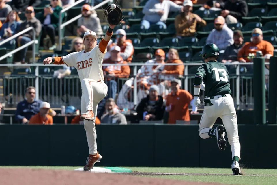 AUSTIN, TX – FEBRUARY 22: Infielder Casey Borba #31 of the Texas Longhorns stretches out for a force out at first base before infielder CJ Deckinga #13 of the Michigan State Spartans can reach the bag during the college baseball game between Texas Longhorns and Michigan State Spartans on February 22, 2026, at UFCU Disch-Falk Field in Austin, TX. (Photo by David Buono/Icon Sportswire via Getty Images)