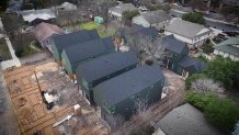Six homes under construction on two lots in Austin, Texas.