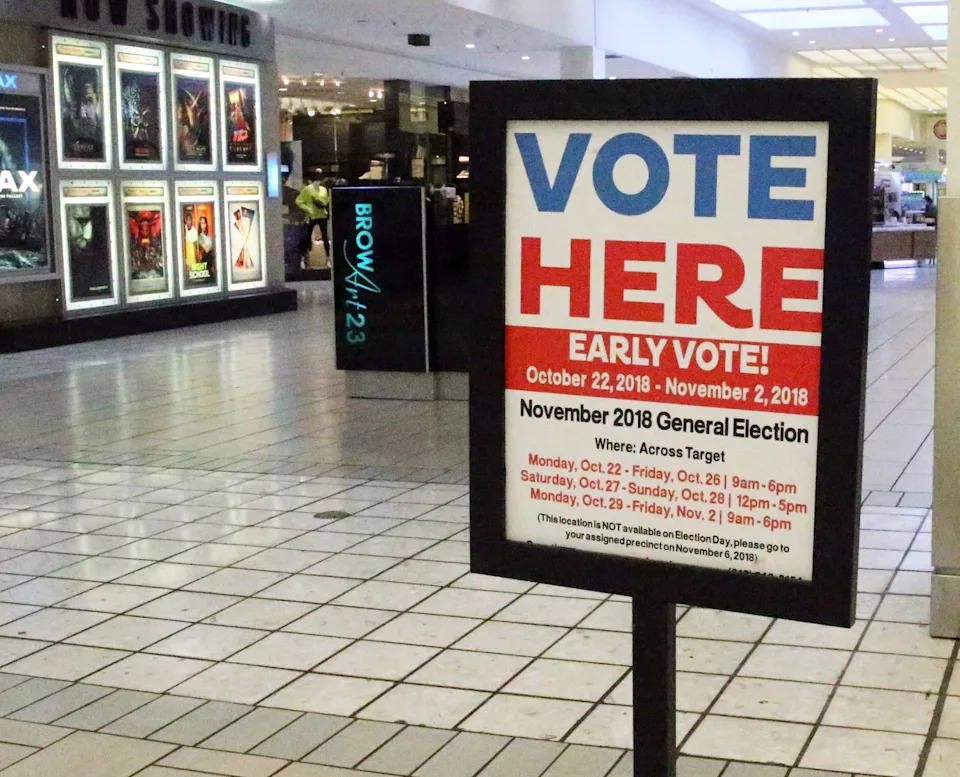 A sign indicates an early polling station for the recent midterm elections inside Bassett Place.