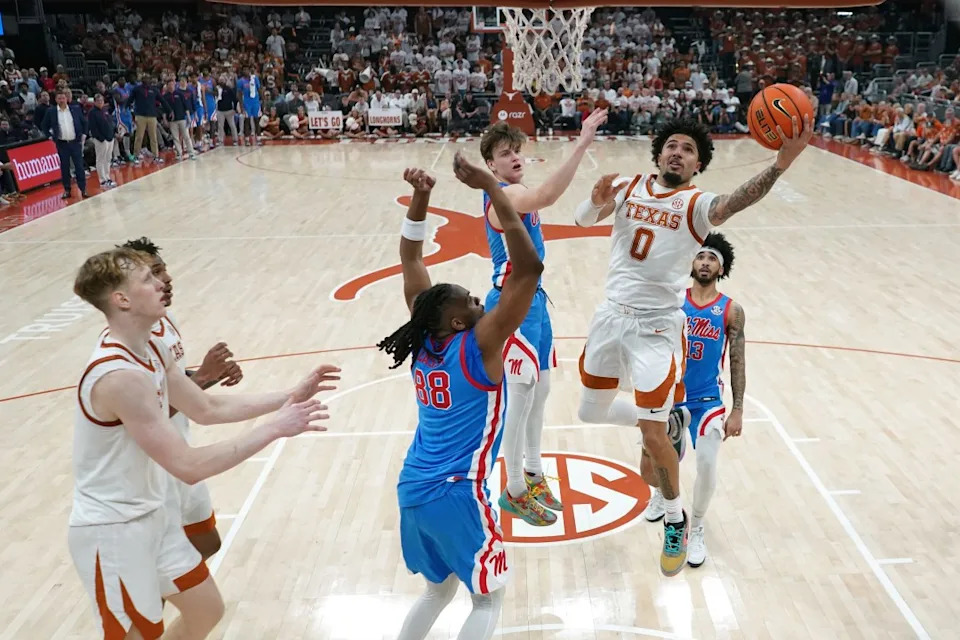 AUSTIN, TEXAS – FEBRUARY 7: Jordan Pope #0 of the Texas Longhorns drives to the basket against Augusto Cassia #88 of the Ole Miss Rebels during the second half at Moody Center on February 7, 2026 in Austin, Texas. (Photo by Scott Wachter/Getty Images)