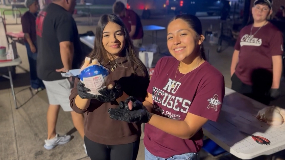 Before most people wake up, these students are already cooking Texas barbecue all day