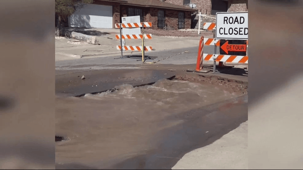 Water in a small sinkhole from a water main break on Adabel Drive. (Credit: KFOX14/CBS4)