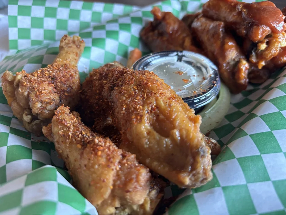 Undisputed Craft House, Undisputed Craft House, at 1881 Saul Kleinfeld Drive, has creative and delicious sauces. Our favorites are the Watermelon and Tajin, and the Sweet & Tangy BBQ with plenty of thick sauce.