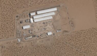 This Aug. 7, 2025, satellite image shows construction of large white tents for a new immigrant detention center at Fort Bliss, a U.S. Army base outside El Paso, Texas. (Planet Labs via AP)