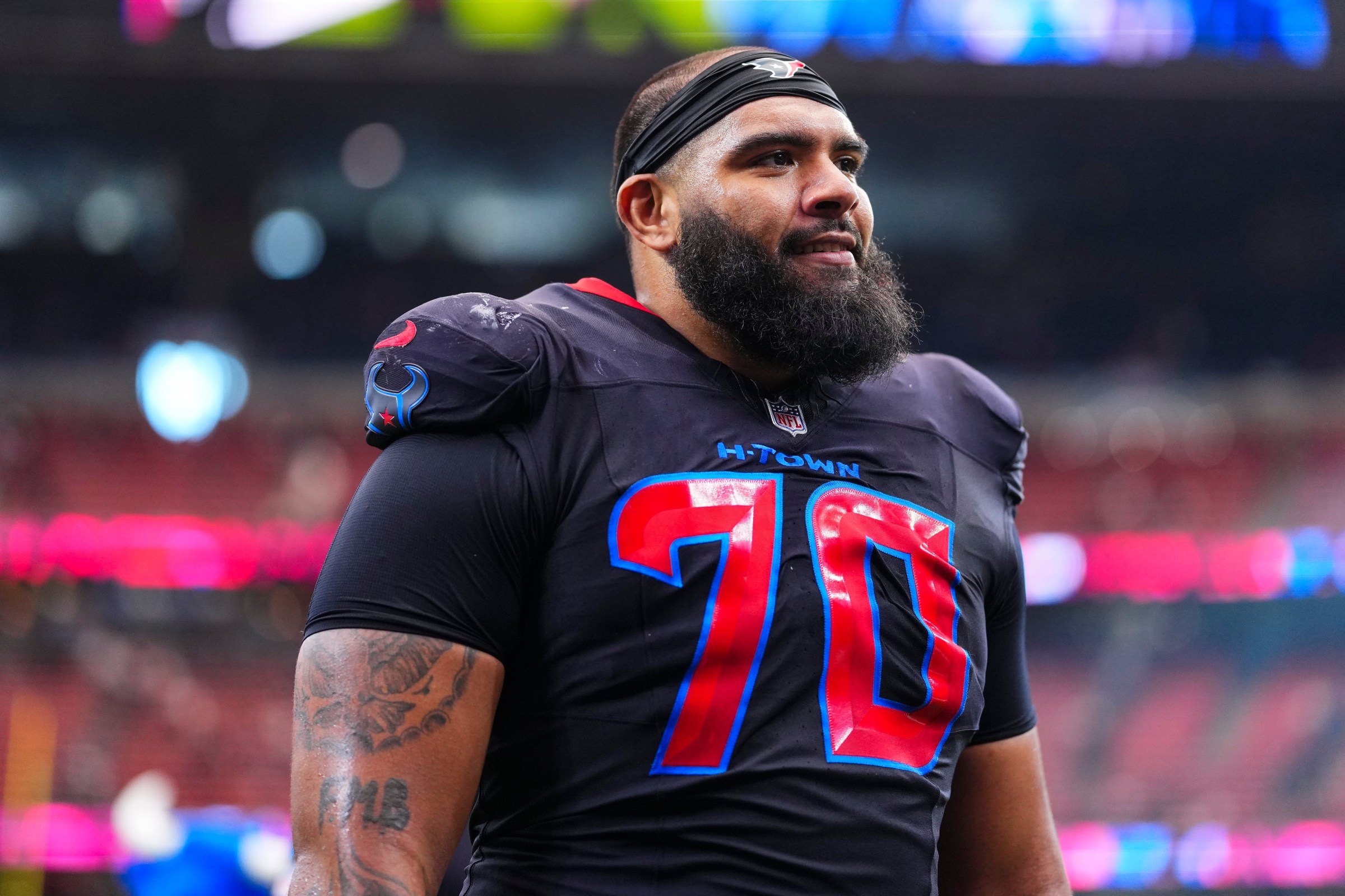 HOUSTON, TX - JANUARY 04: Juice Scruggs #70 of the Houston Texans exits the field after an NFL football game against the Indianapolis Colts at NRG Stadium on January 4, 2026 in Houston, Texas. (Photo by Cooper Neill/Getty Images)