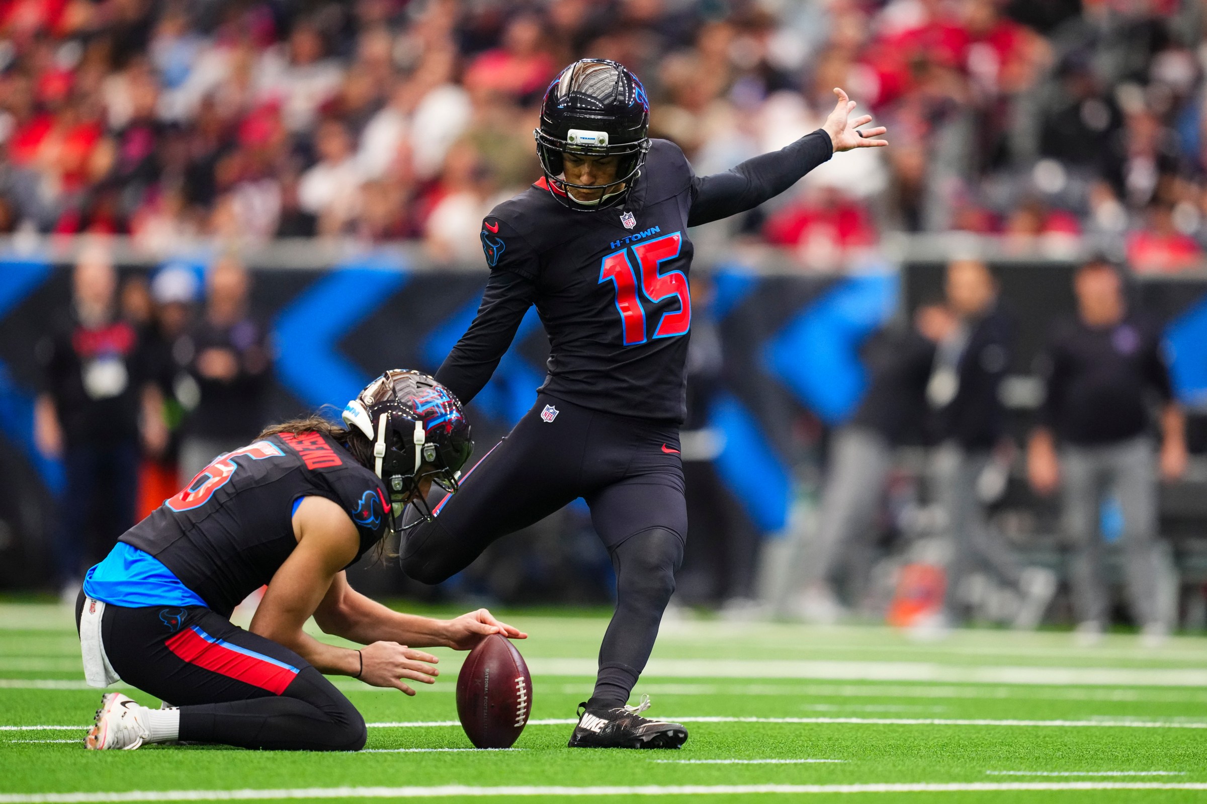 HOUSTON, TX - JANUARY 04: Ka’imi Fairbairn #15 of the Houston Texans kicks for a field goal during an NFL football game against the Indianapolis Colts at NRG Stadium on January 4, 2026 in Houston, Texas. (Photo by Cooper Neill/Getty Images)