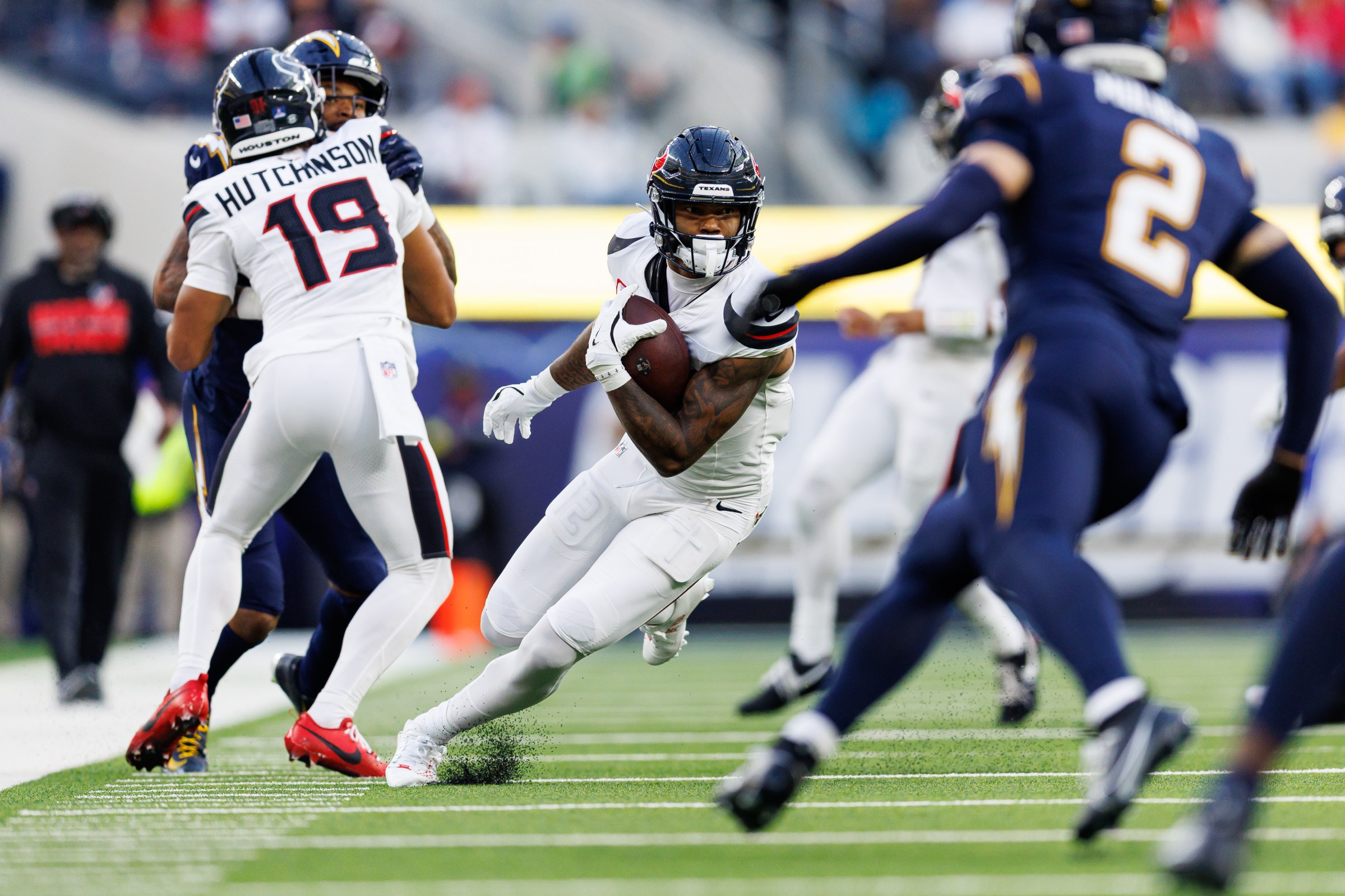 INGLEWOOD, CALIFORNIA - DECEMBER 27: Nico Collins #12 of the Houston Texans completes a catch during the third quarter of an NFL football game against the Los Angeles Chargers at SoFi Stadium on December 27, 2025 in Inglewood, California. (Photo by Brooke Sutton/Getty Images)