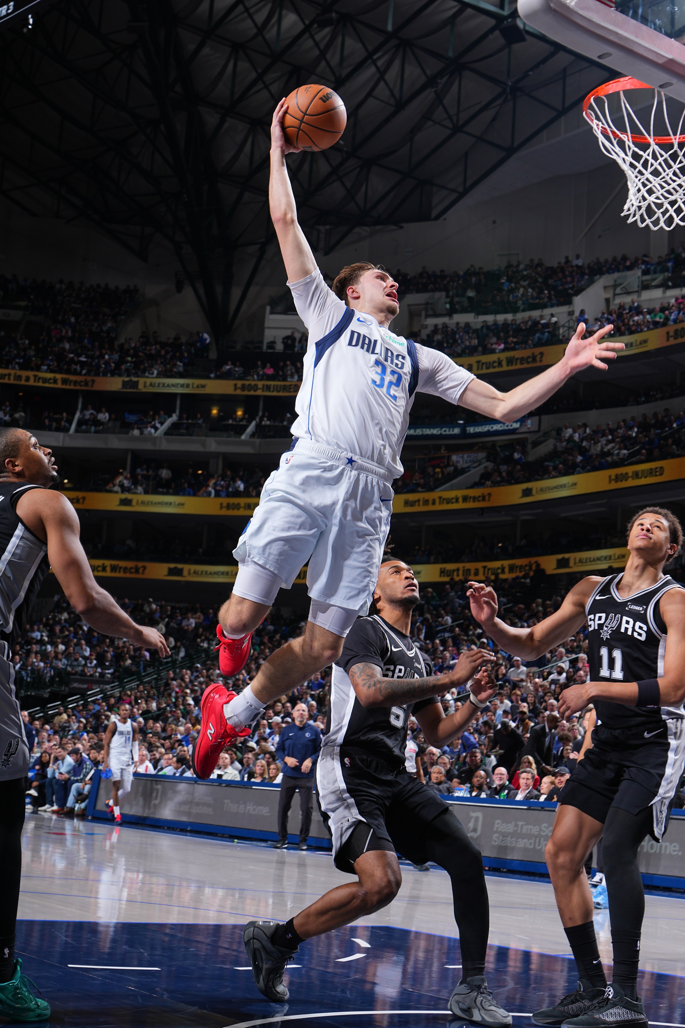 DALLAS, TX - FEBRUARY 5: Cooper Flagg #32 of the Dallas Mavericks dunks the ball during the game against the San Antonio Spurs on February 5, 2026 at American Airlines Center in Dallas, Texas. NOTE TO USER: User expressly acknowledges and agrees that, by downloading and or using this photograph, User is consenting to the terms and conditions of the Getty Images License Agreement. Mandatory Copyright Notice: Copyright 2026 NBAE (Photo by Garrett Ellwood/NBAE via Getty Images)