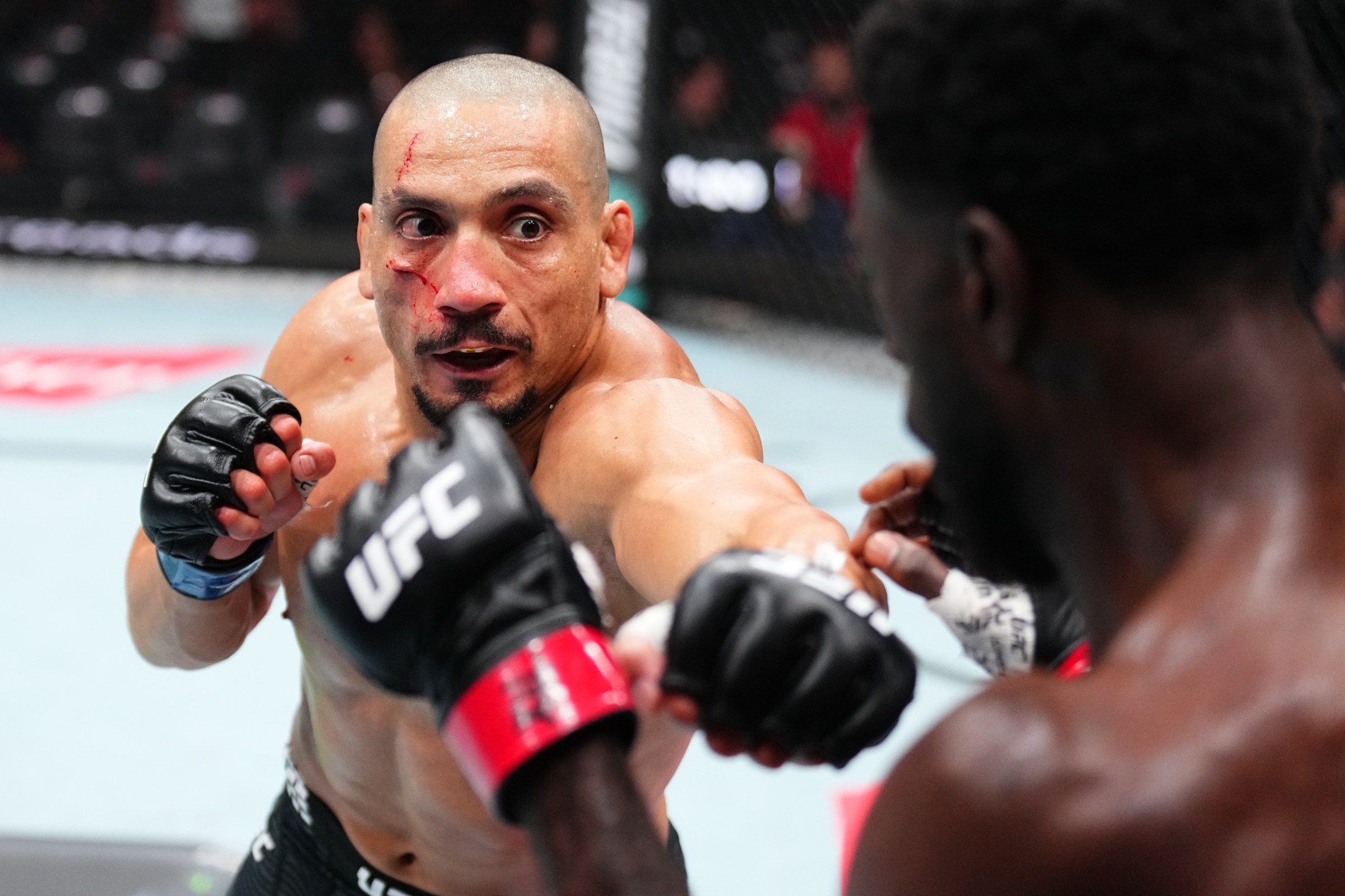 HOUSTON, TEXAS - FEBRUARY 21: (L-R) Carlos Leal of Brazil punches Chidi Njokuani in a welterweight fight during the UFC Fight Night event at Toyota Center on February 21, 2026 in Houston, Texas. (Photo by Chris Unger/Zuffa LLC)