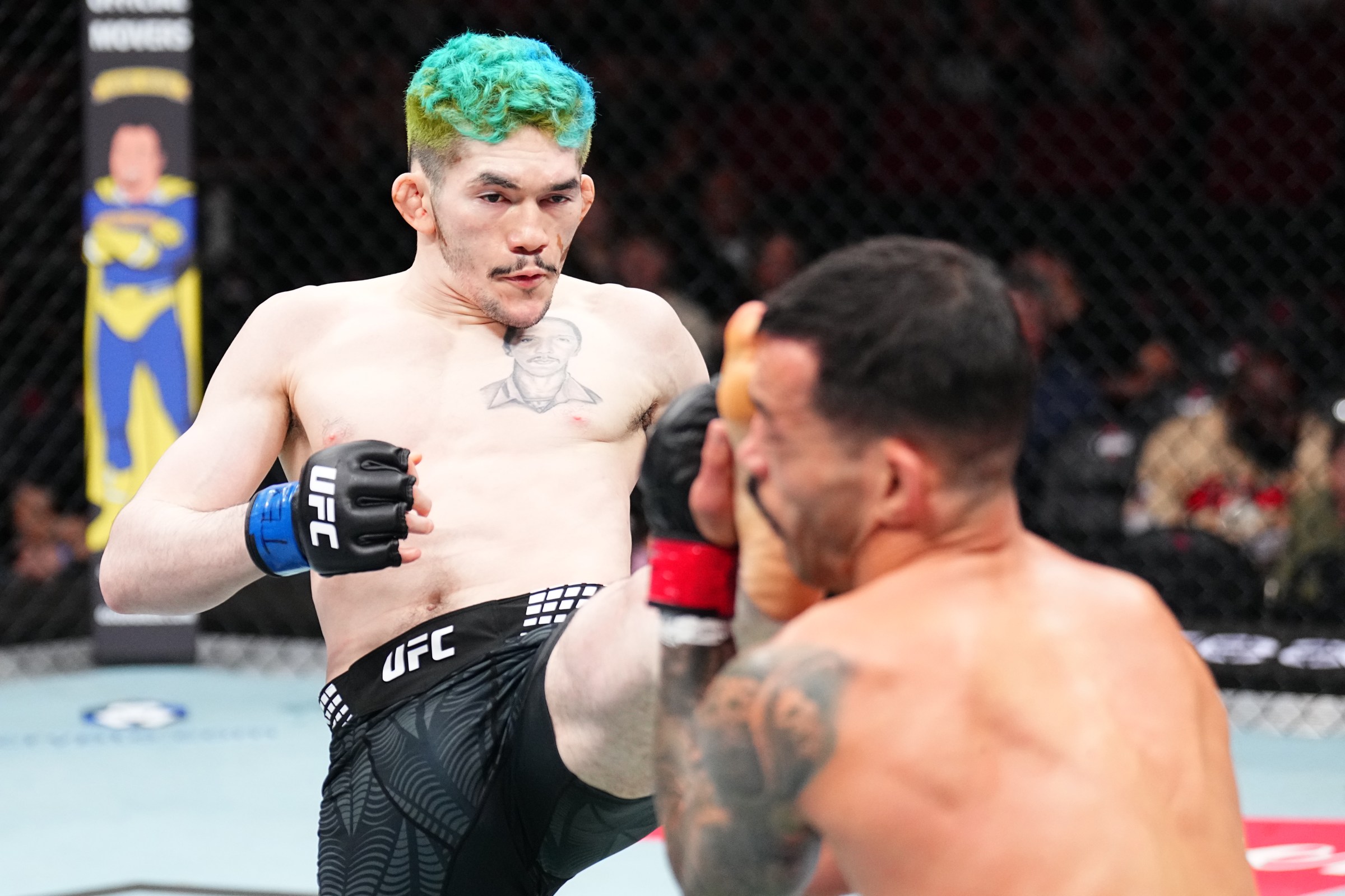 HOUSTON, TEXAS - FEBRUARY 21: Melquizael Costa of Brazil kicks Dan Ige in a featherweight fight during the UFC Fight Night event at Toyota Center on February 21, 2026 in Houston, Texas. (Photo by Chris Unger/Zuffa LLC)