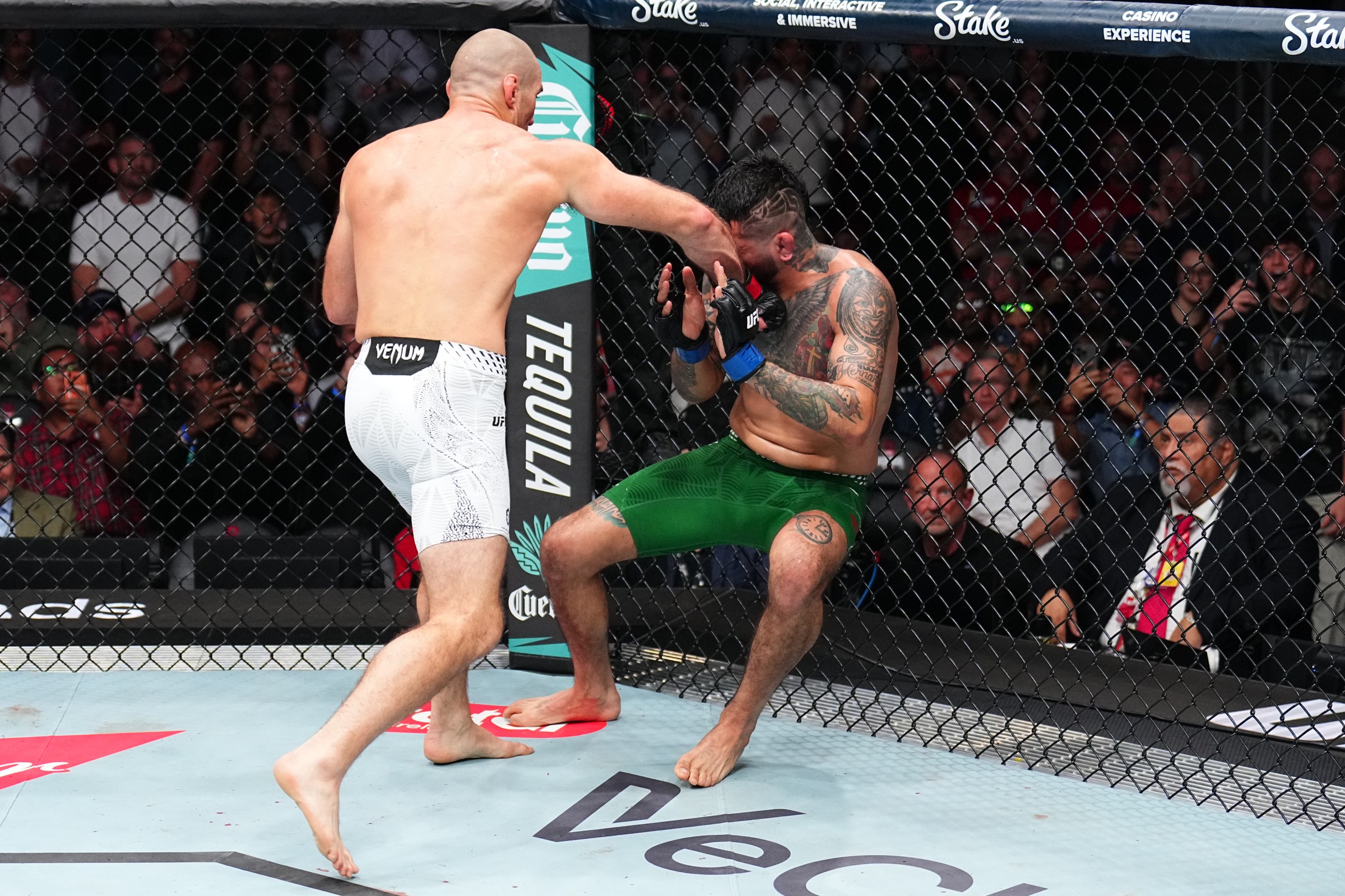 HOUSTON, TEXAS - FEBRUARY 21: Sean Strickland punches Anthony Hernandez in a middleweight fight during the UFC Fight Night event at Toyota Center on February 21, 2026 in Houston, Texas. (Photo by Chris Unger/Zuffa LLC)