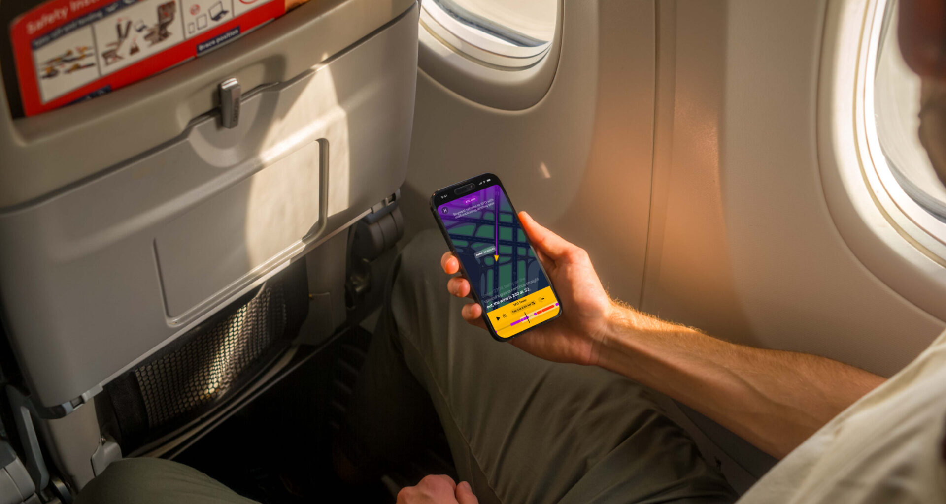 airline passenger uses the ATC app on an iPhone