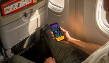 airline passenger uses the ATC app on an iPhone