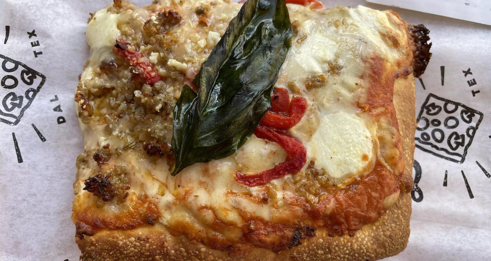 Pizza Leila vodka-sausage-pepper pizza slice