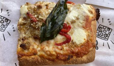 Pizza Leila vodka-sausage-pepper pizza slice