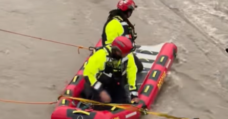 Video shows Dallas Fire-Rescue saving two men from rising creek waters
