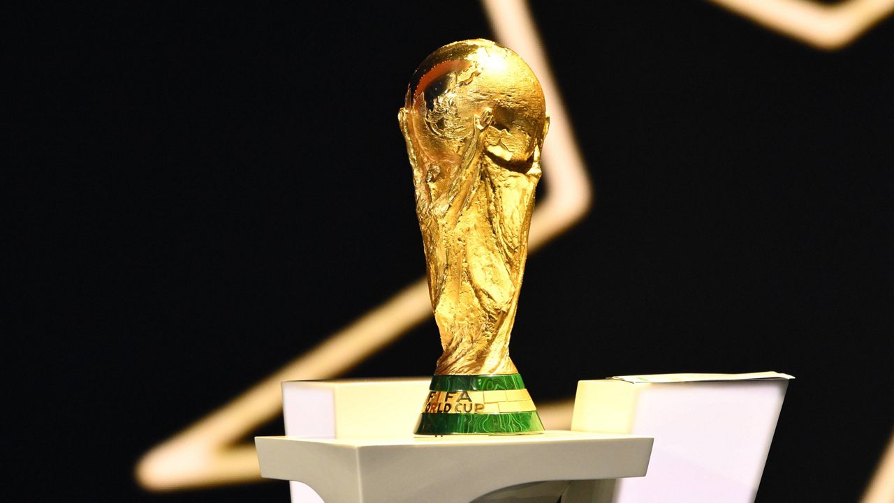 The World Cup trophy is displayed during the draw for the 2026 soccer World Cup at the Kennedy Center in Washington, Friday, Dec. 5, 2025. (Mandel Ngan/Pool Photo via AP)