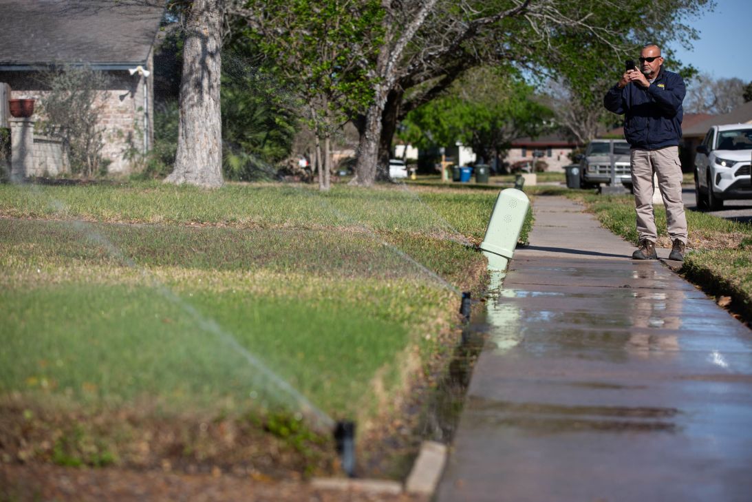 A Corpus Christi water utilities enforcement official documents a potential watering violation in March 2025.