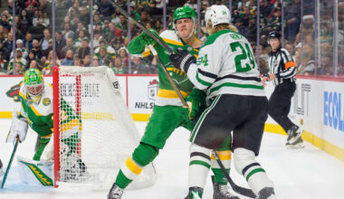 Dec 11, 2025; Saint Paul, Minnesota, USA; Minnesota Wild center Joel Eriksson Ek (14) and Dallas Stars center Roope Hintz (24) collide behind the net in the second period at Grand Casino Arena. Mandatory Credit: Matt Blewett-Imagn Images