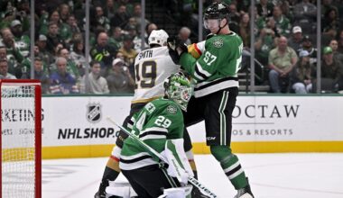 Mar 10, 2026; Dallas, Texas, USA; Dallas Stars defenseman Tyler Myers (57) moves Vegas Golden Knights right wing Reilly Smith (19) out of the crease in front of goaltender Jake Oettinger (29) during the third period at the American Airlines Center. Mandatory Credit: Jerome Miron-Imagn Images