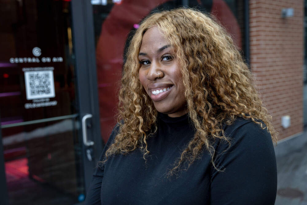 Central Square Business Improvement District marketing director Manoucheca Lord outside the Central on Air studio in Cambridge, Mass. (Robin Lubbock/WBUR)