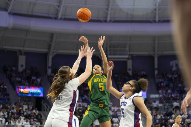 Senior wing Darianna Littlepage-Buggs drives toward the basket, throwing up a shot in traffic during the Bears' 65-53 loss on Sunday evening against TCU at Schollmaier Arena in Fort Worth. Jake Schroeder | Photographer
