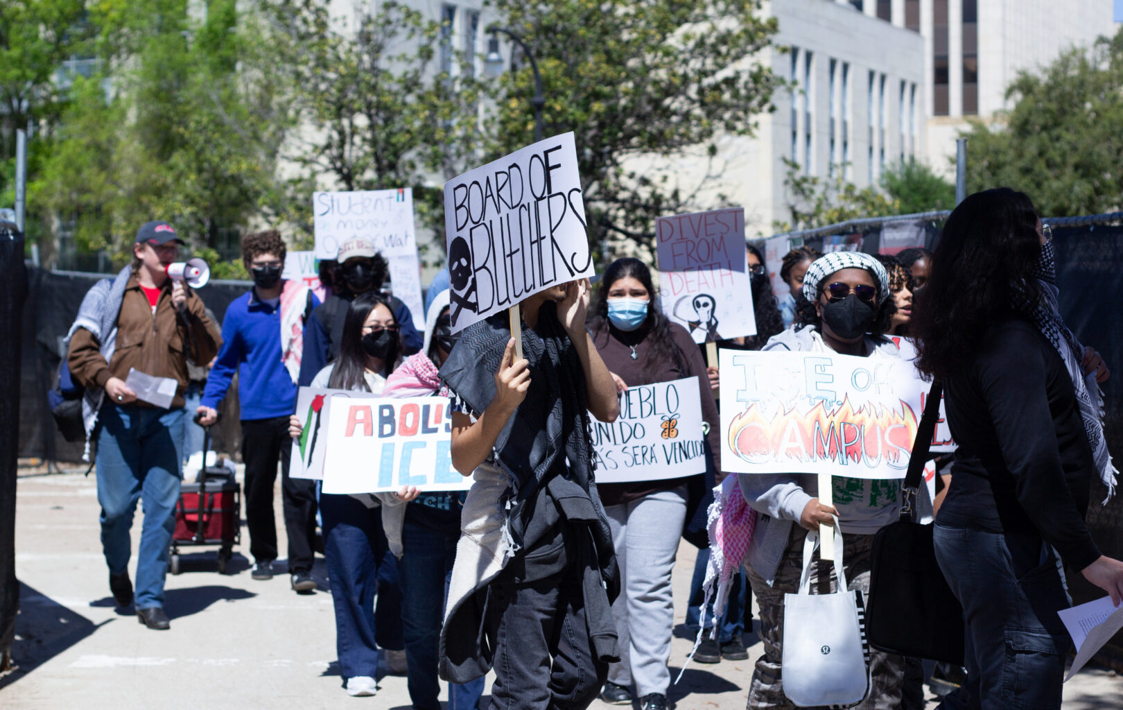 Students protest Board of Regents meeting calling for divestment, sanctuary campus