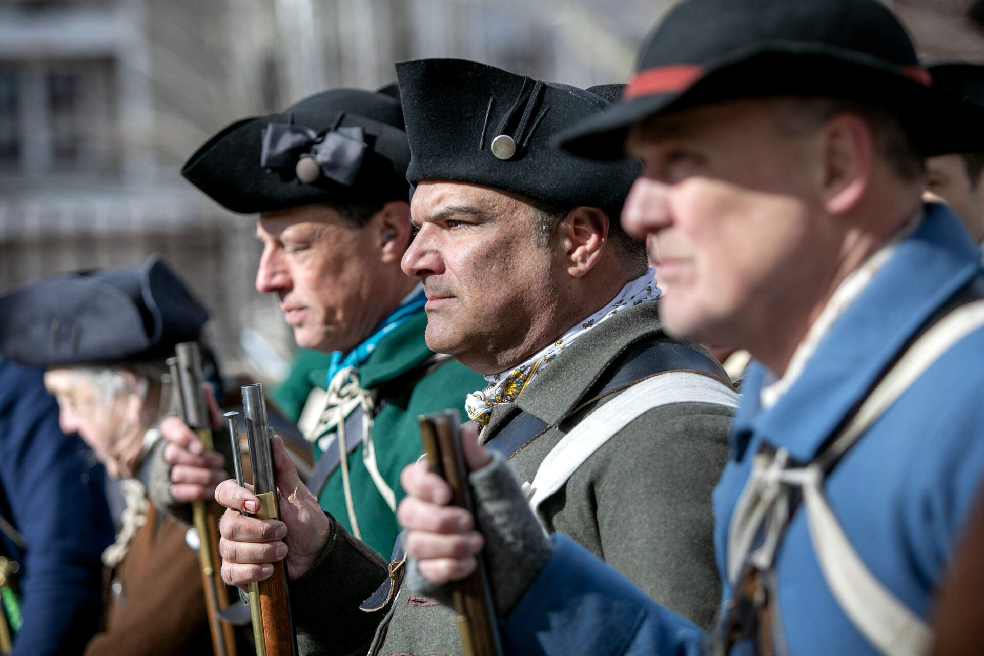 Reenactors gather outside St. Augustine’s Chapel to commemorate the 250th Anniversary of the Siege of Boston and Evacuation Day. (Robin Lubbock/WBUR)