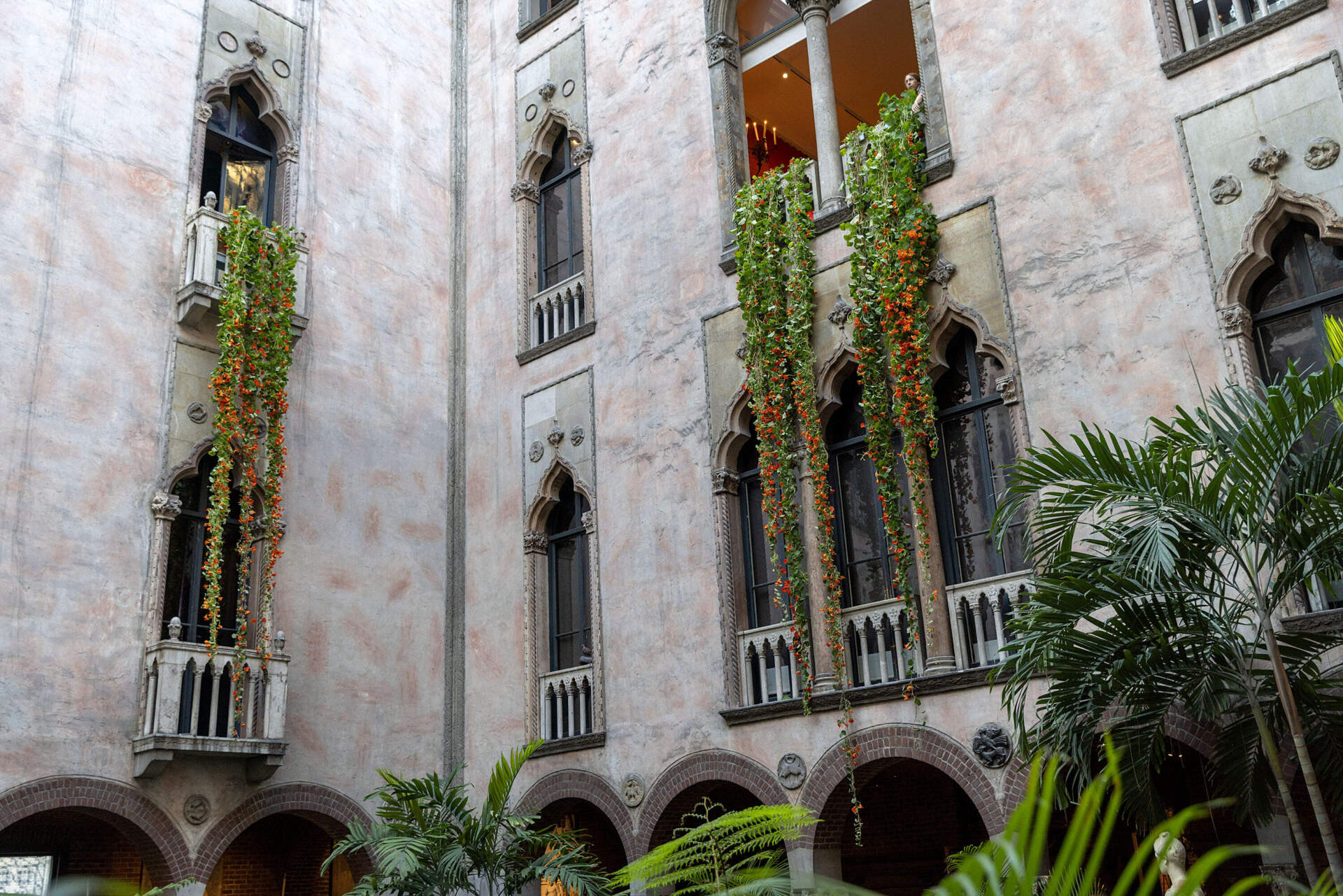 Nasturtium vines hang down the walls of the courtyard at the Isabella Stewart Gardner Museum. (Robin Lubbock/WBUR)